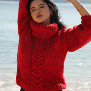 woman with a read knitted sweater